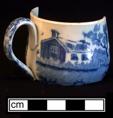 Pearlware printed underglaze handled cup. Rim diameter: 1.75”. Lot:6, Provenience:1G1.424.7, Privy Stratum 2. 18BC38